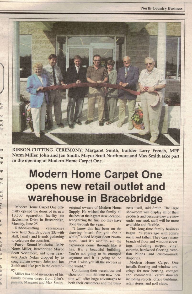 a picture of the grand opening of the new location in 2001